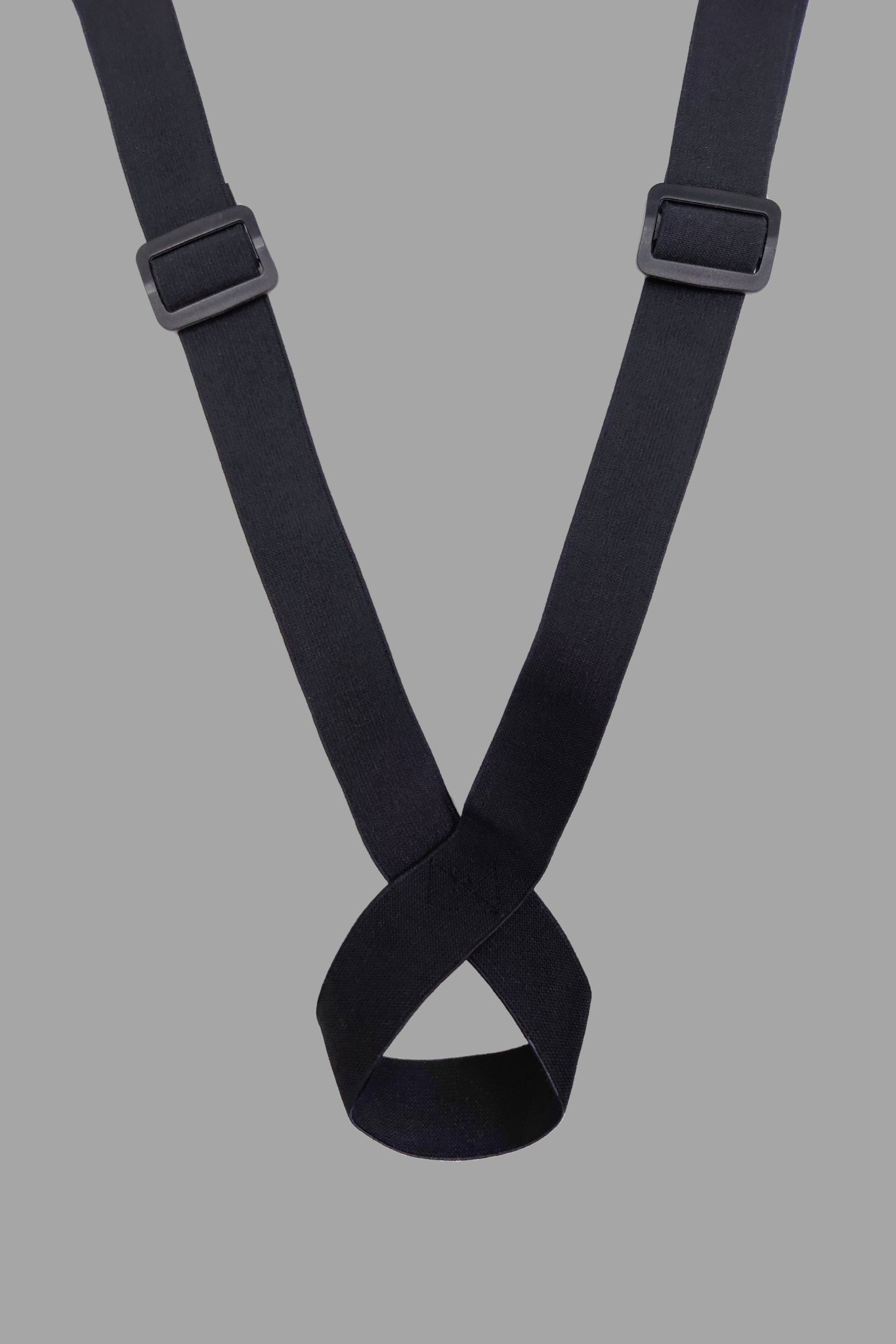 Black and red Outtox body harness with snaps from Maskulo Global (EU) online store. A supportive accessory with metal detailing.