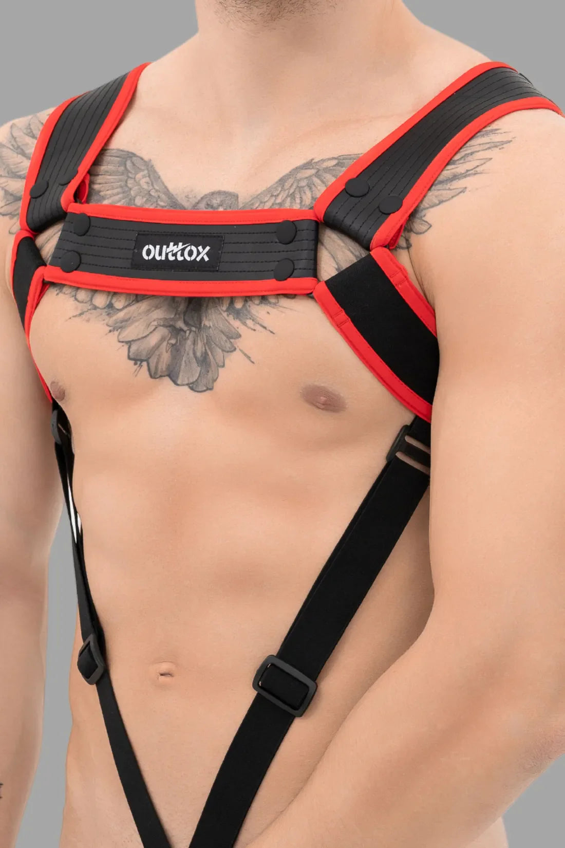 Outtox. Bodyharnas met drukknopen. Zwart+Rood