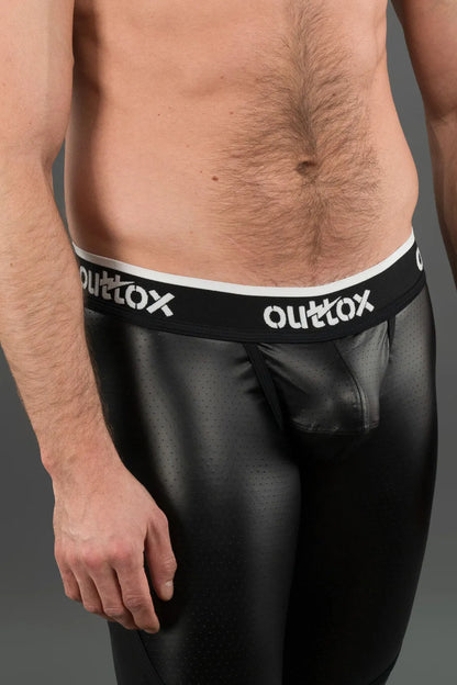 Outtox. Leggings traseros con cremallera y bragueta a presión. Negro