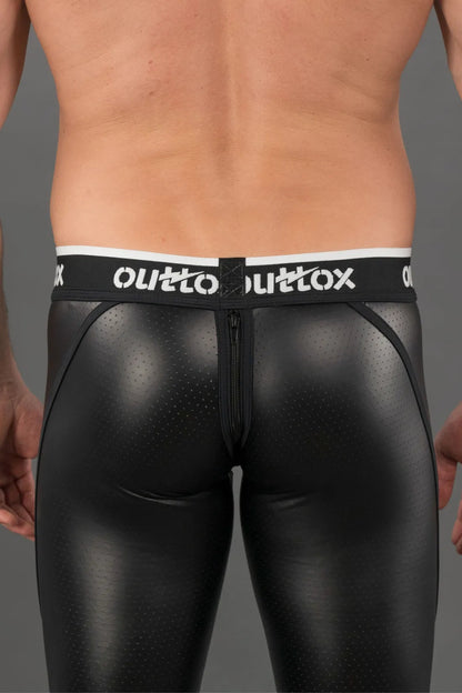 Outtox. Achterlegging met ritssluiting en drukknoopsluiting. Zwart