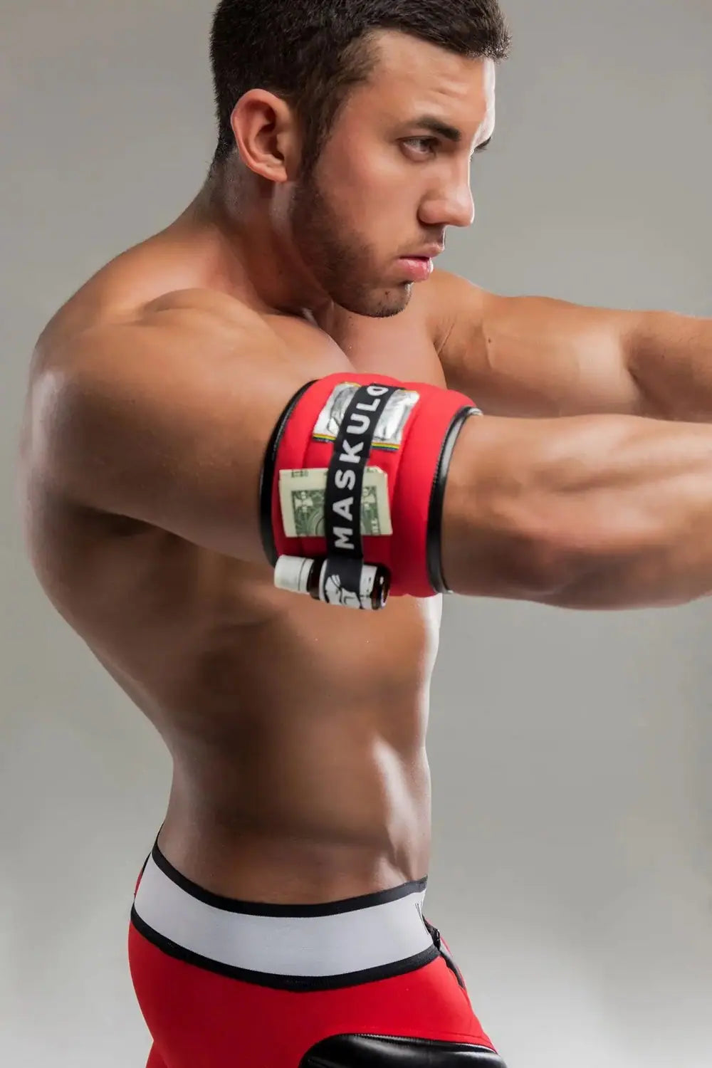 Maskulo Armored red Biceps Armband for men, featuring an inner zipper wallet pocket and stretch holder