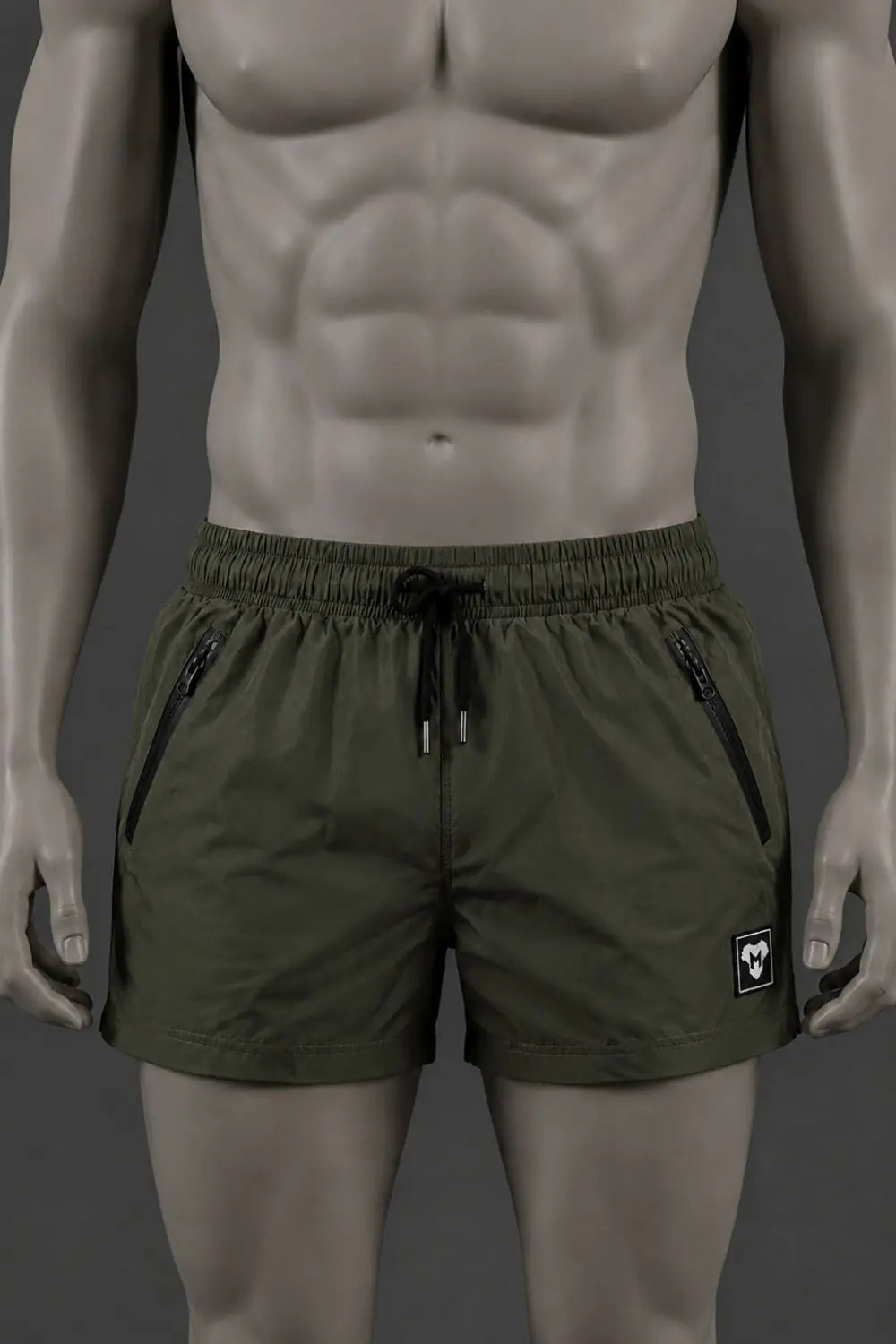 Jedd Synther Weiche Shorts mit Reißverschlusstaschen. Armeegrün