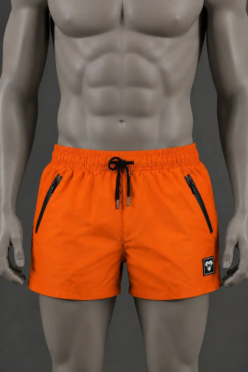 Jedd Synther Weiche Shorts mit Reißverschlusstaschen. Orange