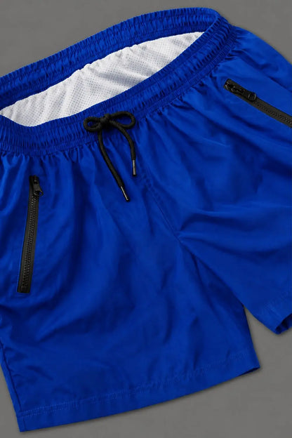 Short Jedd Synther Soft avec poches zippées. Bleu roi