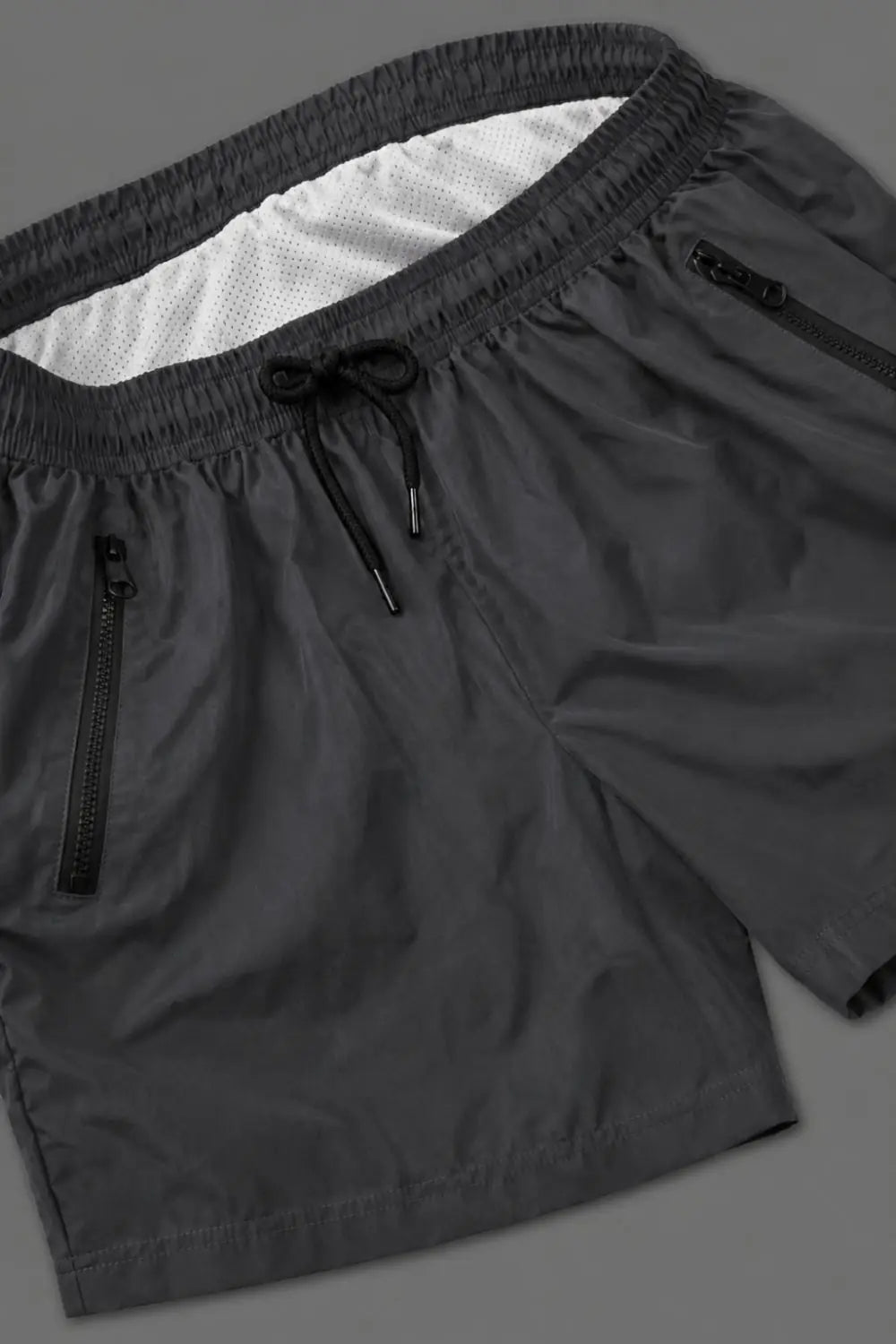 Short Jedd Synther Soft avec poches zippées. Gris acier